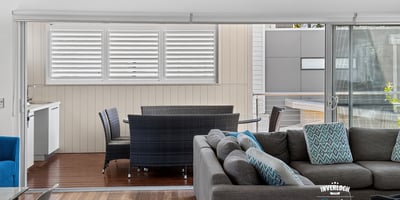 Bright and spacious living area seamlessly connects to a private outdoor space, perfect for relaxation.