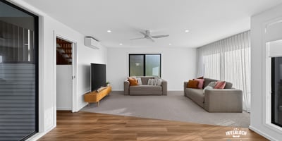Spacious living area featuring modern finishes and ample natural light, perfect for relaxed entertaining.