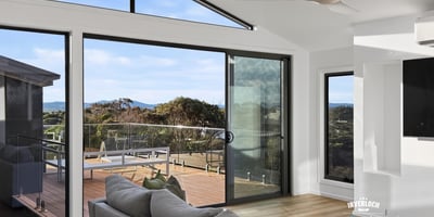 Bright open-plan living space with expansive views and seamless indoor-outdoor flow, perfect for modern living.