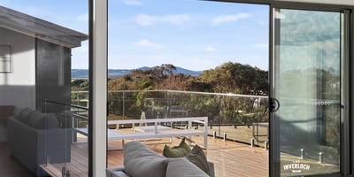 Spacious living area with expansive views, featuring large windows that invite abundant natural light.