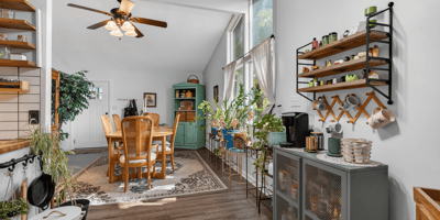 Bright and airy dining area featuring ample natural light and a cozy atmosphere for gatherings.
