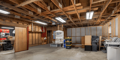Spacious workshop with open layout, ready for customization and ideal for storage or workshop projects.