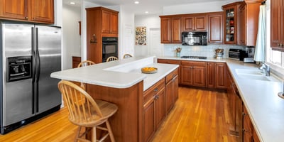 Enjoy cooking with ample prep space, double sink with backyard view, lots of storage, and a pantry.