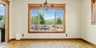 Enjoy natural light and peaceful outdoor scenes from this inviting dining area. Framed by Arts & Crafts trim, it's perfect for everyday meals or entertaining.