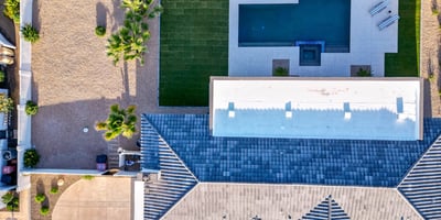 Overhead perspective shows the home s prime golf course setting with open green views and private backyard retreat.