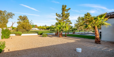 A generous side yard offers potential for a guest casita, sport court, or custom outdoor living project, adding value and options.