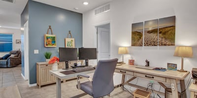 This multi-use room accommodates desks, seating, and storage with ease. Updated finishes and bright lighting make it ideal for work or relaxation in Litchfield Park.