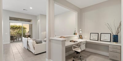 Built-in work-from-home space with sleek countertops and cabinetry, blending productivity and design within the main living areas.