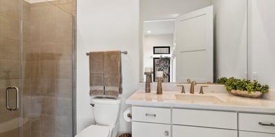 Contemporary casita bathroom with walk-in shower and sleek finishes. Provides hotel-style comfort within this Scottsdale guest suite.