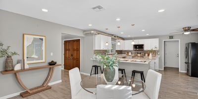Dining space seamlessly connected to the kitchen and living areas, enhancing openness and natural light.