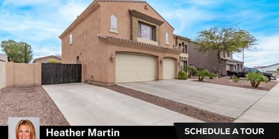A clean, expansive driveway leads to the roomy 3-car garage, perfect for storage and hobbies. This Glendale home blends energy efficiency with everyday convenience.