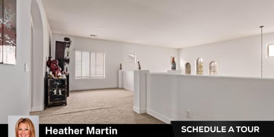 The open loft provides additional living space ideal for work, entertainment, or play. Overlooking the main floor, it enhances the spacious design of this Glendale home with private backyard pool.