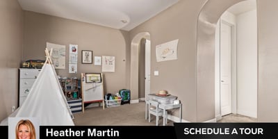 This inviting secondary bedroom includes plush carpet, ceiling fan, and neutral paint tones. A functional and cozy space within this Glendale home featuring updated kitchen and backyard pool.