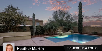 The illuminated pool creates a resort-style ambiance perfect for relaxing evenings. Surrounded by privacy walls and desert landscaping, this Glendale backyard is built for comfort and entertaining.