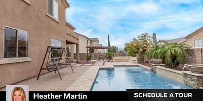 This Glendale home features a private backyard retreat with a sparkling pool, stone water features, and expansive patio space. Designed for entertaining, the outdoor living area offers low-maintenance landscaping and year-round enjoyment.