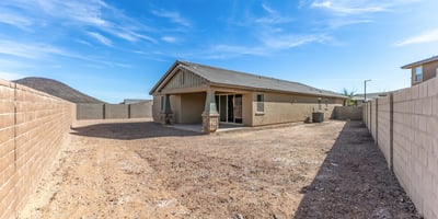 Expansive backyard ready for custom landscaping, outdoor living, or pool addition. Private and fully enclosed for added comfort