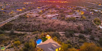 Aerial perspective showcasing expansive lot size, privacy, and breathtaking Scottsdale mountain views in a sought-after desert setting.