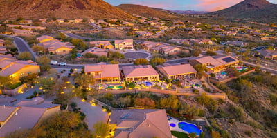 Scottsdale aerial capturing the hillside location, private pool, and landscaped backyard with surrounding desert terrain.