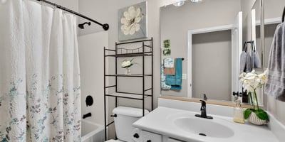 Full bathroom featuring a tub and shower combo with clean finishes. Designed for functionality and ease in Casa Grande.