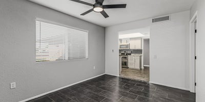 Bright and open room with updated flooring and natural light. This Sun City home offers versatile space to fit your lifestyle needs.