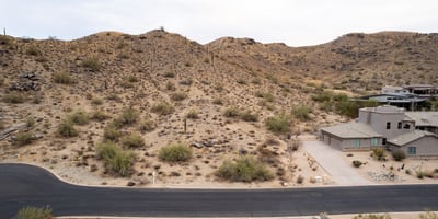 Elevated desert homesite with nearby hiking trail access and scenic mountain views. This Phoenix property combines natural desert beauty, privacy, and luxury custom home potential in a highly desirable hillside location.