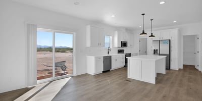 Open-concept living area designed for modern lifestyles with abundant natural light, durable flooring, and direct access to outdoor spaces. The spacious layout creates an inviting atmosphere for entertaining and daily living.