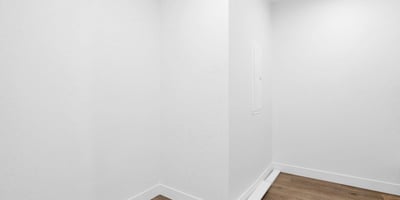 Dedicated laundry and storage space designed for efficiency and organization. The clean finishes and durable flooring provide a functional area that supports everyday household tasks with ease.