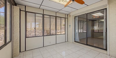 This enclosed Arizona room provides additional living space with abundant natural light and easy indoor-outdoor flow. The flexible layout is ideal for recreation, hobbies, entertaining, or casual relaxation.
