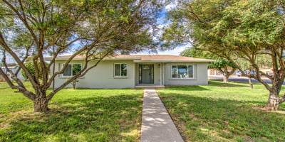Mature trees, fresh landscaping, and updated exterior finishes welcome you to this beautifully remodeled Buckeye home with exceptional curb appeal and move-in-ready condition.