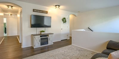 Flexible upstairs loft with updated flooring and generous space for a media room, game room, study area, or additional family room. An excellent bonus space that adapts to your lifestyle.
