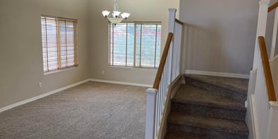 Make a lasting first impression with soaring ceilings, elegant staircase railings, oversized windows, and an open foyer that fills the home with natural light.