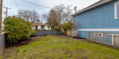 Spacious backyard offers ample potential for landscaping, gardening, or creating your own outdoor retreat.