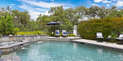 Discover your private oasis with a luxurious pool and tranquil landscaping, perfect for relaxation and entertaining.