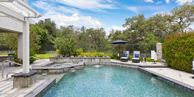 Discover your oasis with a spacious pool and scenic backyard, perfect for relaxation and outdoor entertaining.