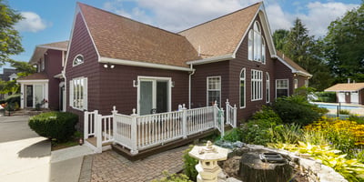 Discover this inviting home with a spacious design, lush gardens, and a refreshing pool area.