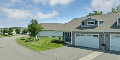 Modern home in a peaceful neighborhood, featuring spacious landscaping and convenient access to nearby amenities.