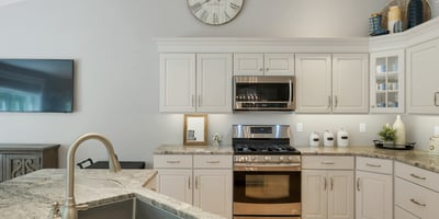 This modern kitchen features sleek cabinetry, high-end appliances, and ample natural light. Ideal for cooking and entertaining.
