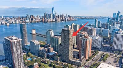 Stunning waterfront property with expansive city views, featuring modern amenities and convenient access to urban attractions.