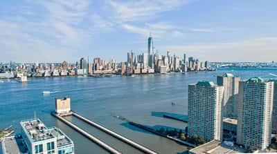 Stunning waterfront property with breathtaking skyline views, offering unparalleled urban living and natural beauty.