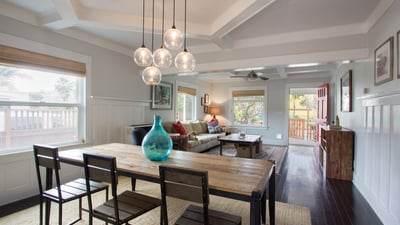 Dining area flows from kitchen into living room. Open floor plan.