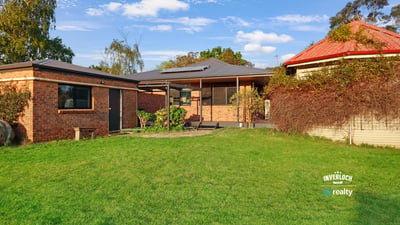 Spacious outdoor area complements this inviting property, perfect for relaxation and entertaining in a family-friendly neighborhood.
