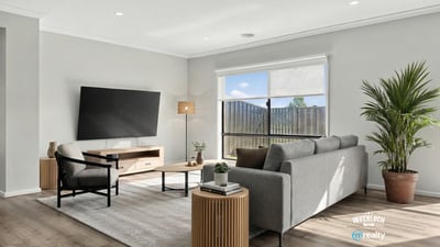 Bright and airy living space featuring modern furnishings and large windows that invite natural light.
