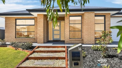 Modern home featuring bright, spacious interiors and a beautifully landscaped yard in a desirable neighborhood.
