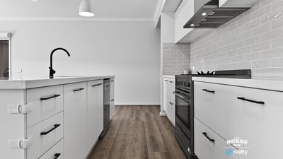Modern kitchen featuring sleek cabinetry, ample counter space, and high-end appliances for culinary enthusiasts.