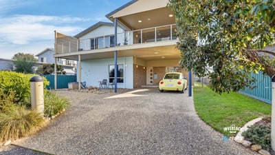Contemporary home with spacious outdoor areas and modern features, perfect for relaxed living and entertaining.