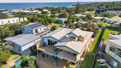 Spacious coastal home offers stunning ocean views, convenient access to local amenities, and ample outdoor space.