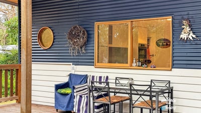 Enjoy outdoor living on this inviting patio, perfect for relaxed gatherings and morning coffee.