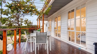 Inviting outdoor space with string lights, perfect for entertaining or relaxing in the fresh air.