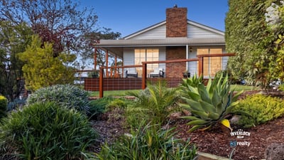 Discover a stunning home with expansive outdoor spaces and picturesque landscaping, perfect for relaxing or entertaining.