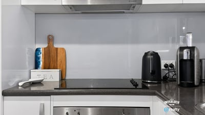 Modern kitchen featuring sleek cabinetry, contemporary appliances, and a functional layout for effortless cooking.